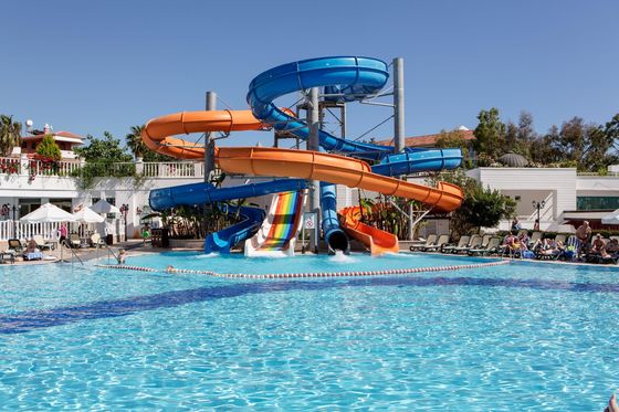 kualitas OEM Taman Hiburan Air Anak-anak Bermain Bersepeda Berenang Fiberglass Water Slide pabrik