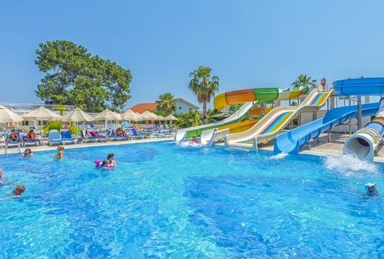 Harga yang bagus ODM Outdoor Water Park Amusement Game Rides Fiberglass Water Slide for Children on line