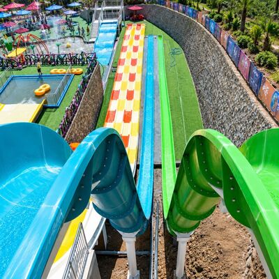 kualitas Profesional Multi Lane Pelangi Racer Serat kaca Water Slide Untuk Aqua Park Proyek pabrik